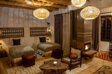 Eden Boutique Hotel Deluxesuite Betten