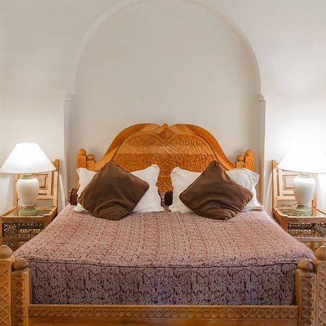 Blick auf ein Bett des Komfortzimmers des Riad Malaika