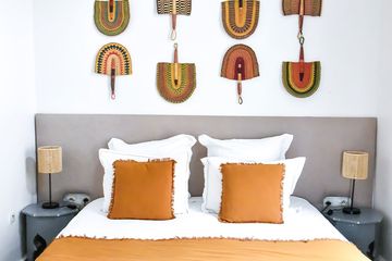 Riad Lyon Mogador Komfortzimmer Bett