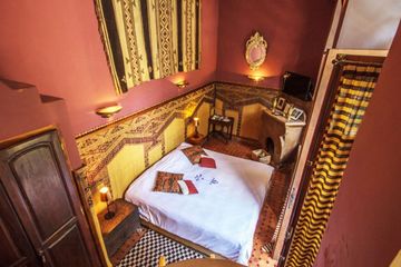 Riad El Arsat Deluxezimmer Bett